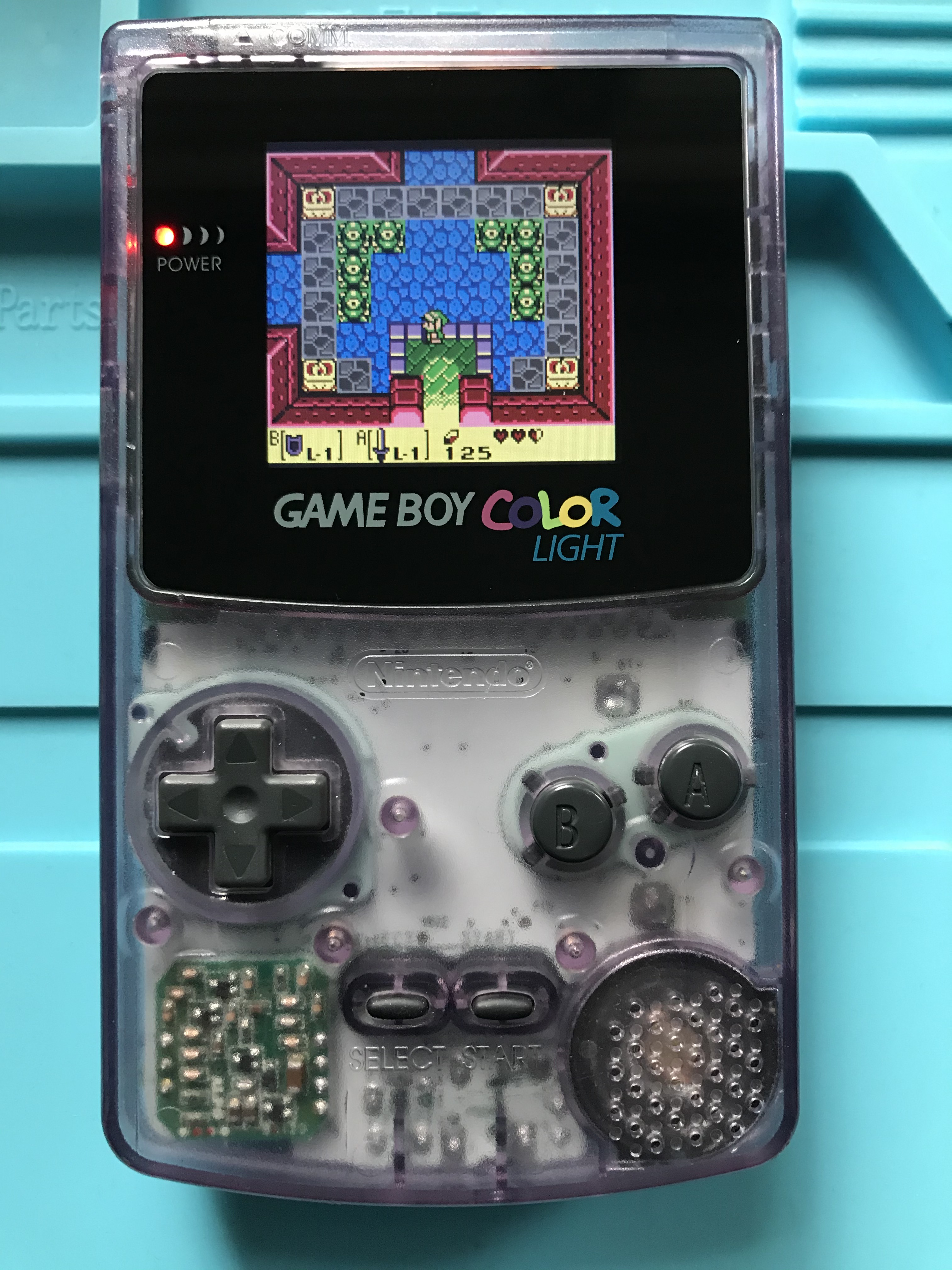 Game Boy Color with aftermarket LCD and custom glass lens by JellyBelly Customs