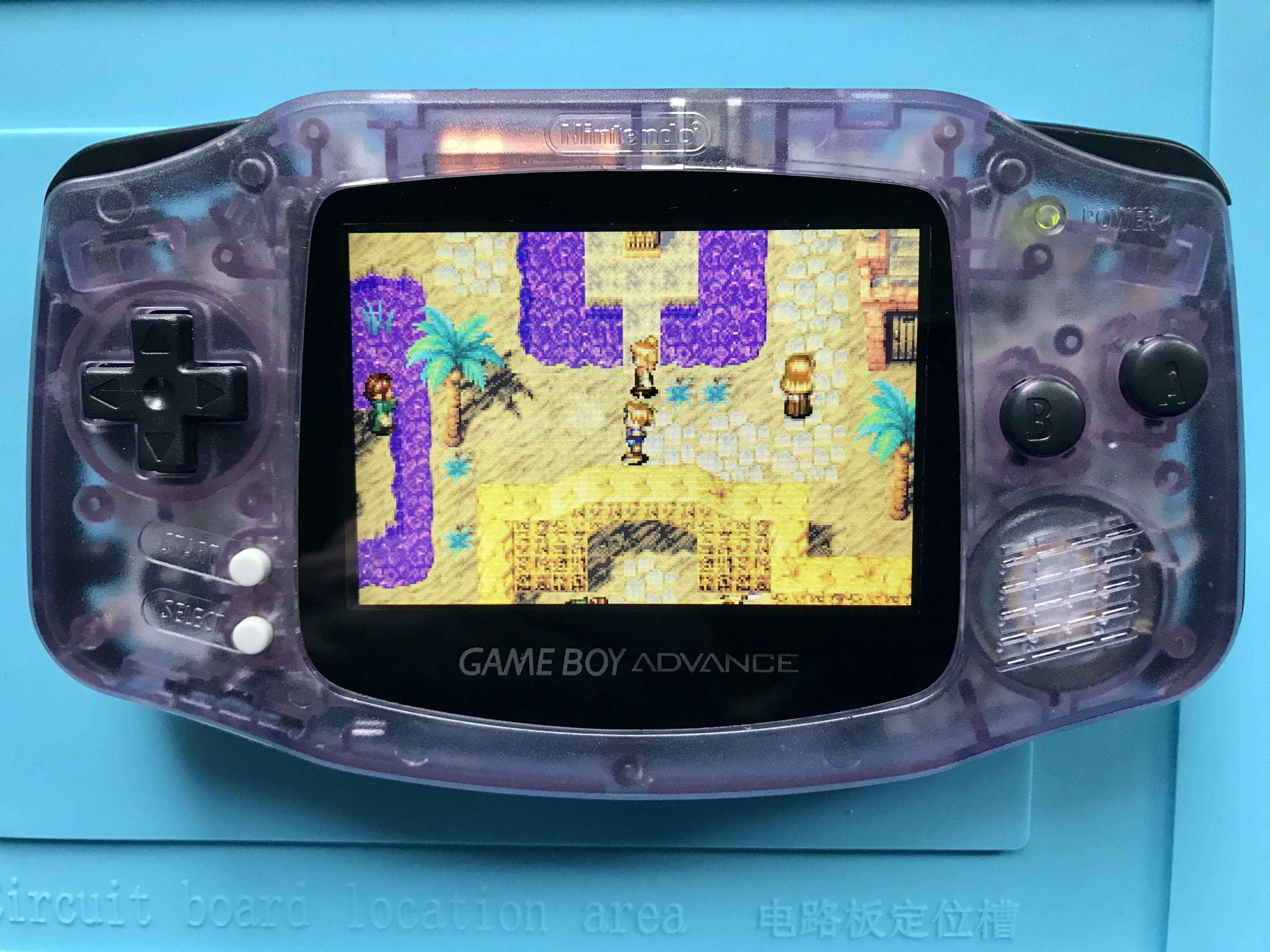 Game Boy Advance IPS V2 LCD in an aftermarket shell with a glass screen lens