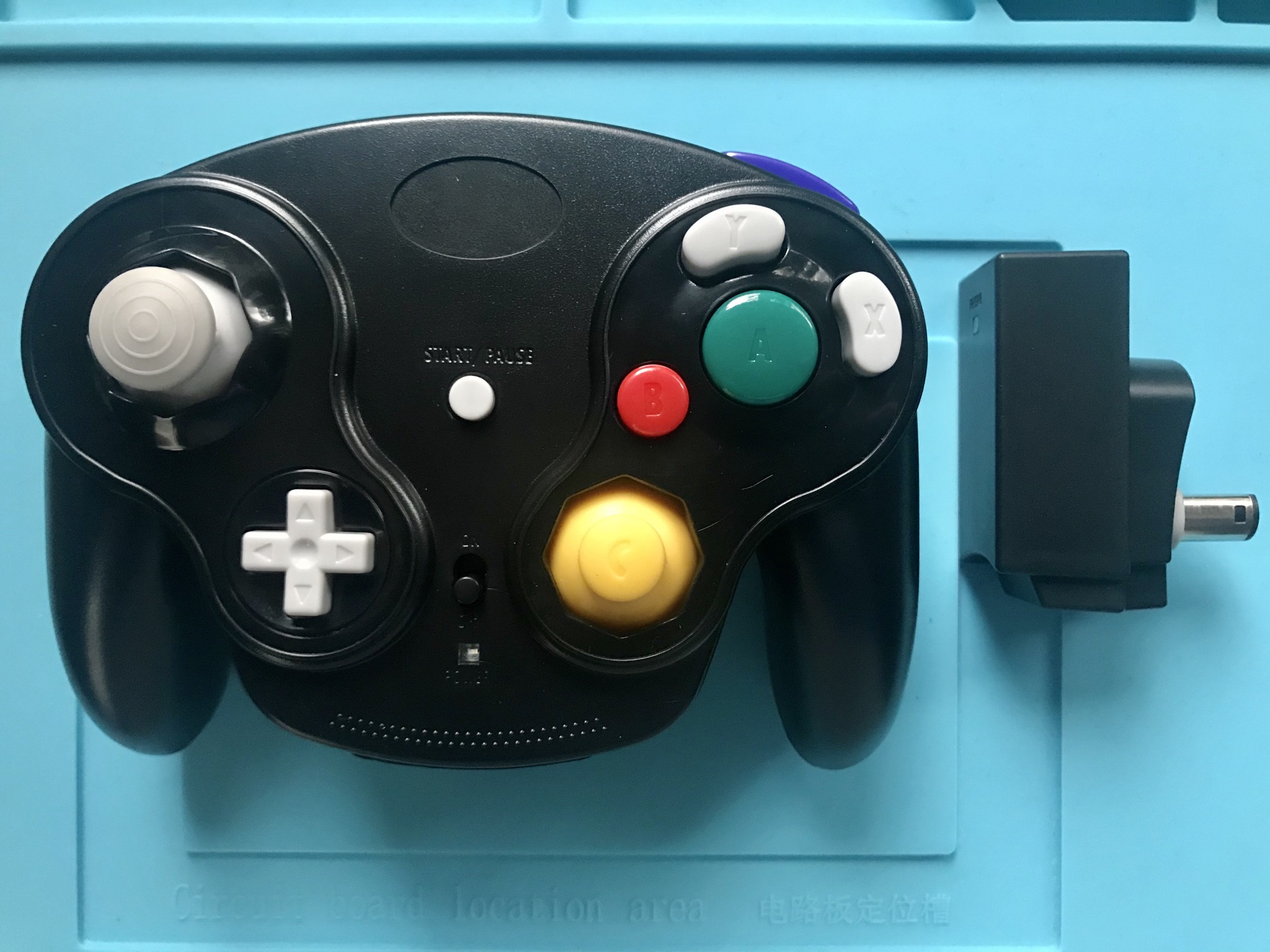 Aftermarket copy of the GameCube WaveBird wireless controller and receiver