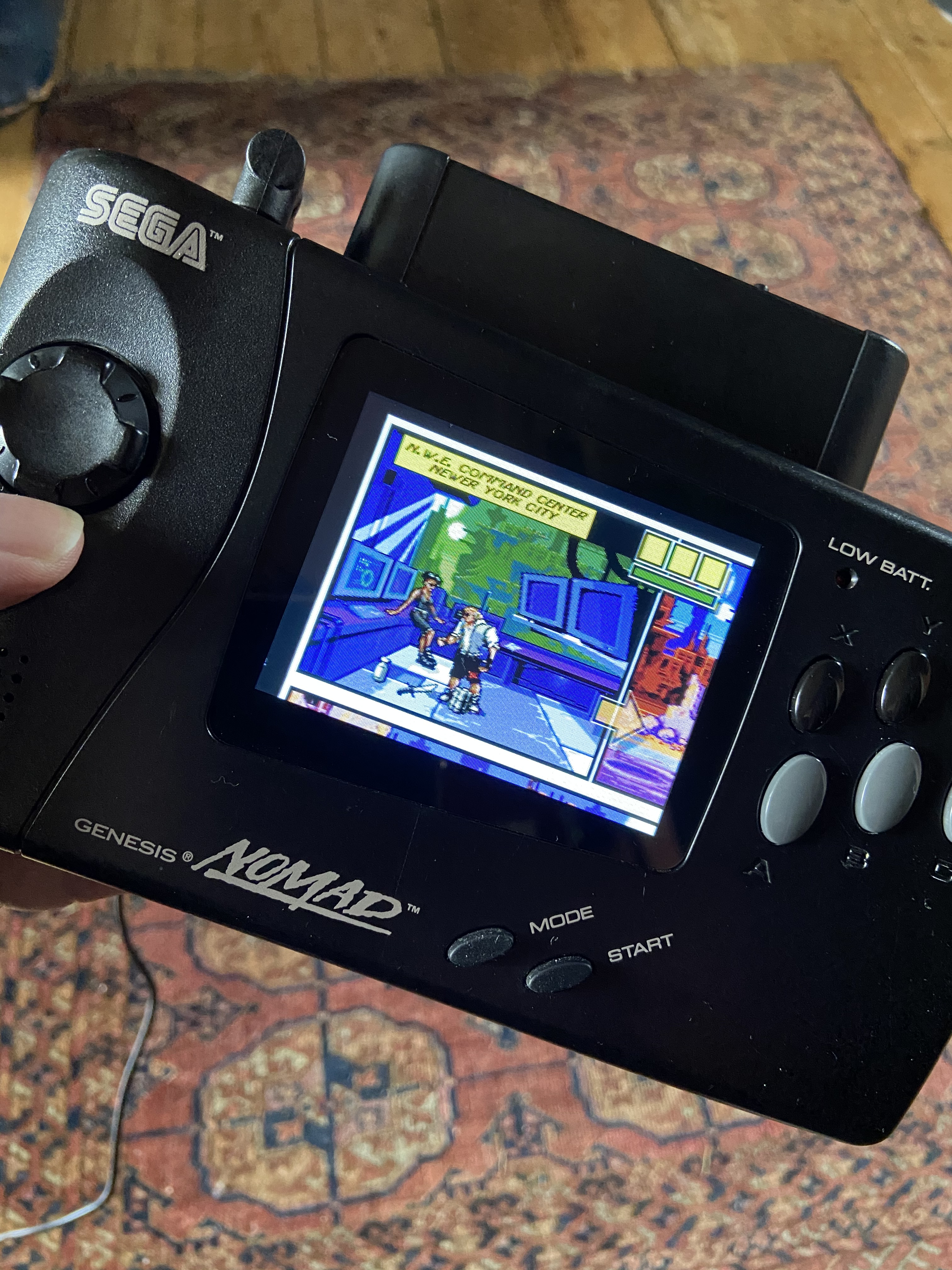 Sega Nomad with aftermarket composite screen installed