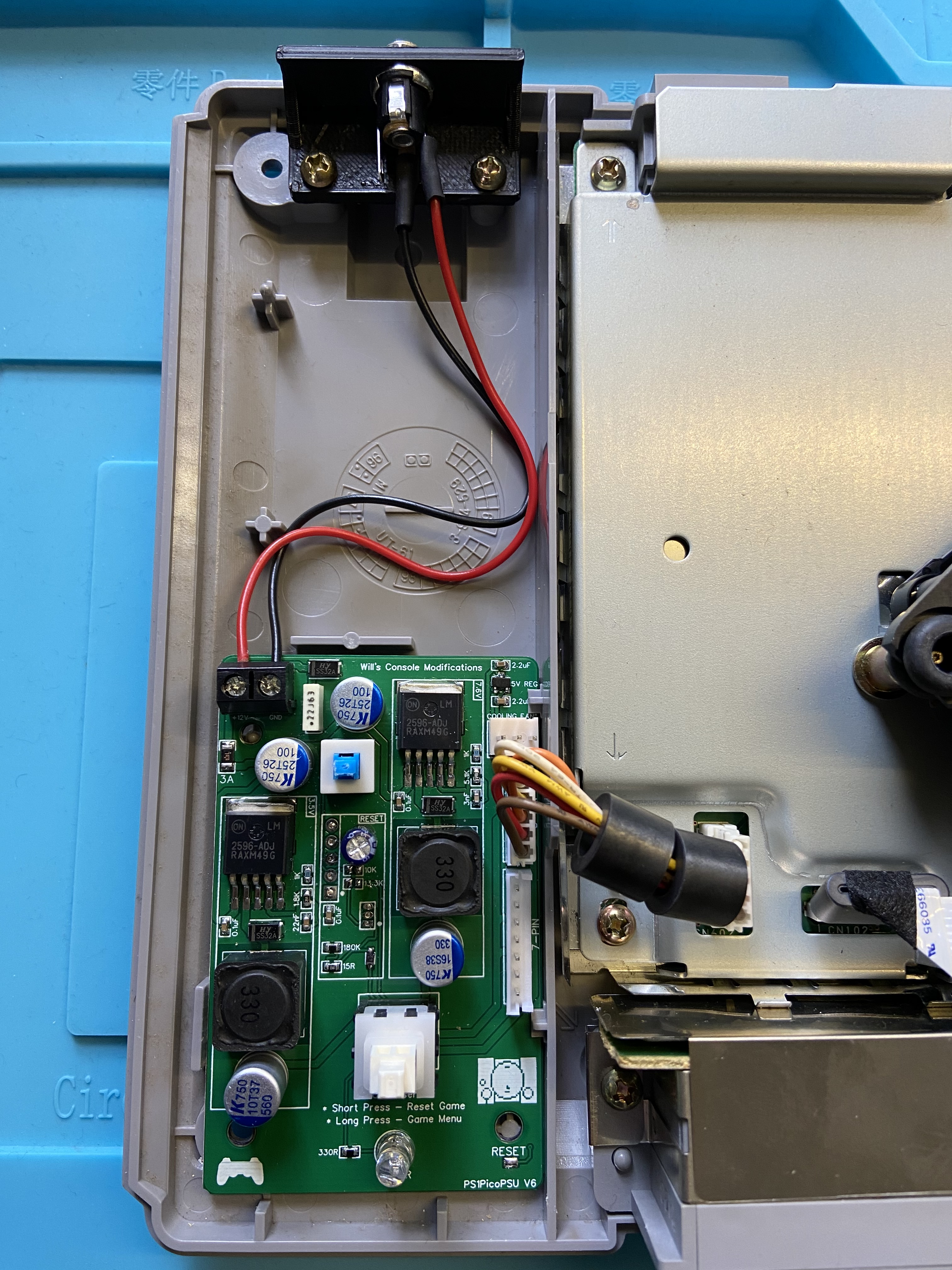 Aftermarket power supply installed in a PlayStation